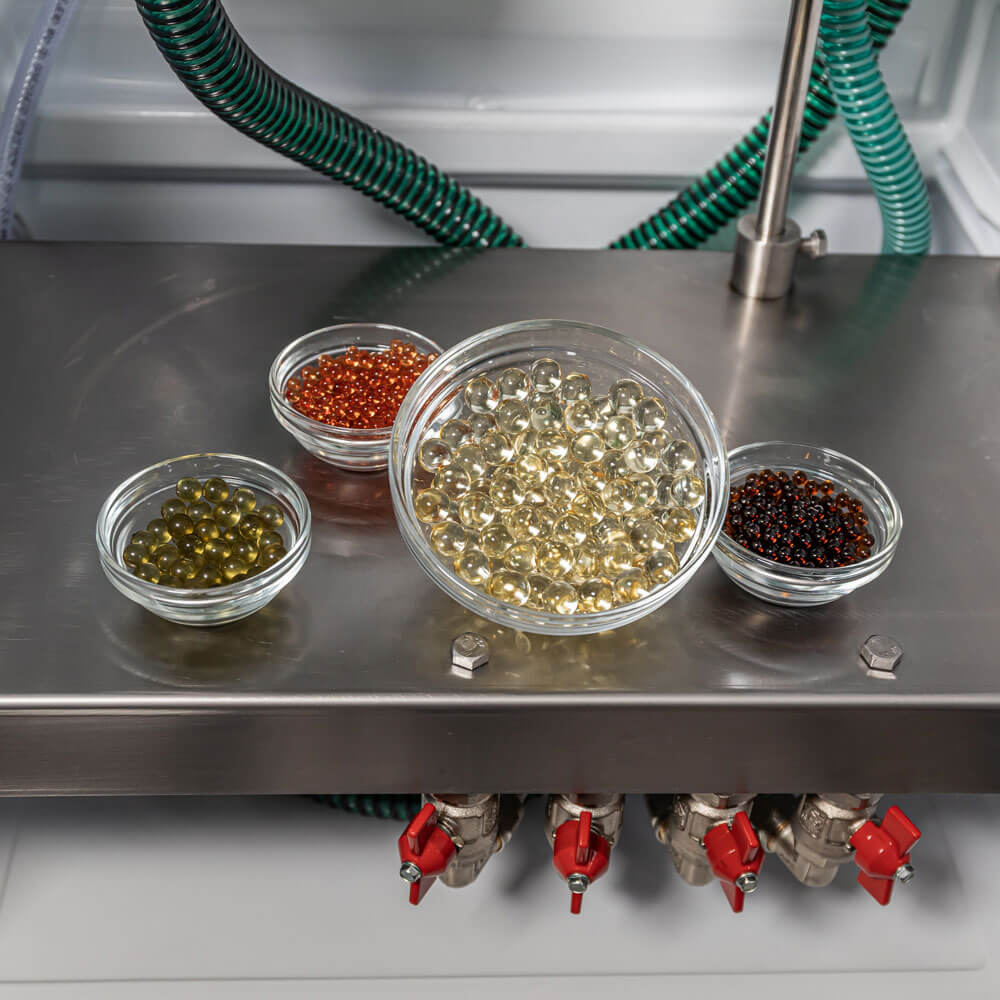 THC oil Encapsulator for the production of thc oil capsules, encapsulating thc oil. THC capsules products from oils, vaping pens, edibles, gummies and more.