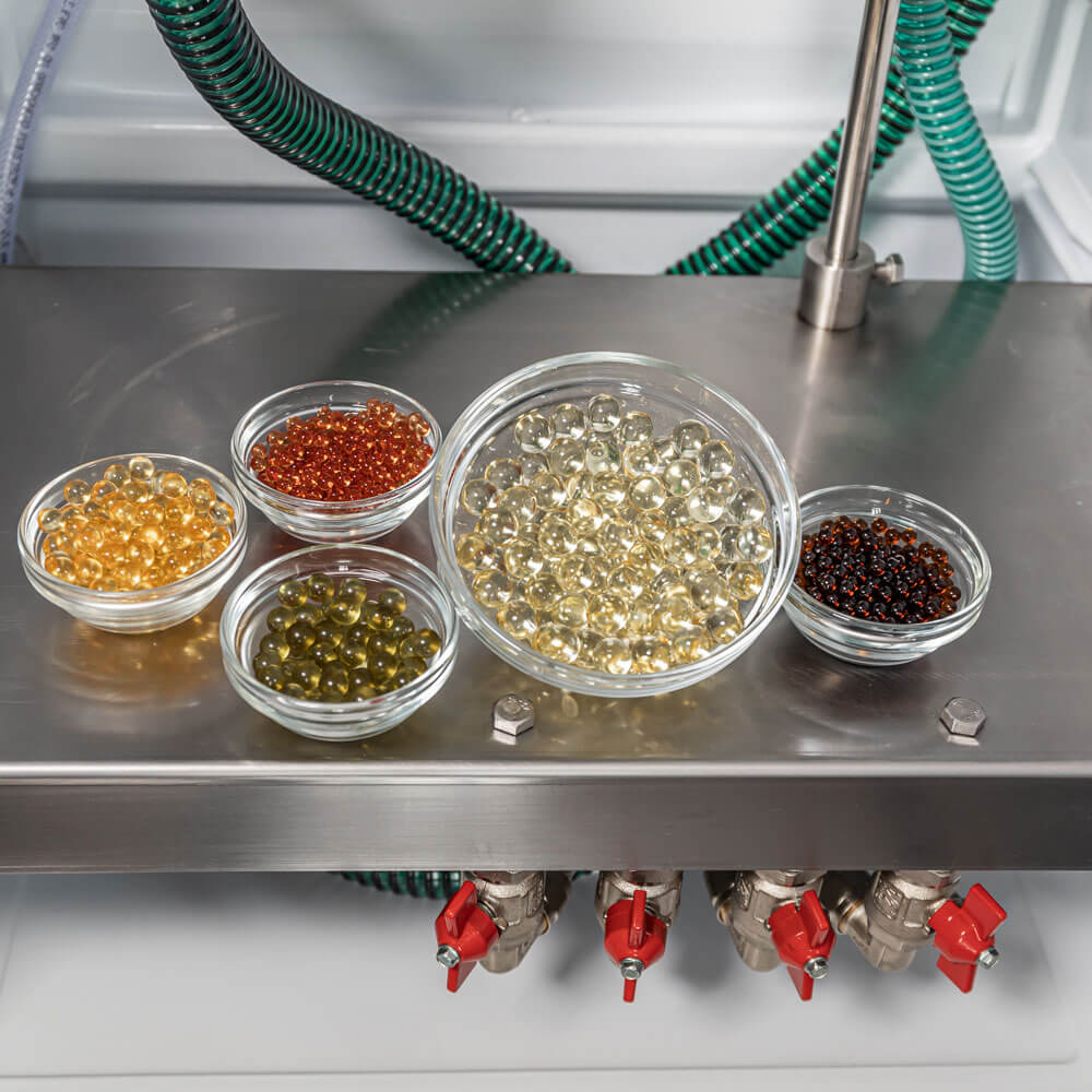 THC oil Encapsulator for the production of thc oil capsules, encapsulating thc oil. THC capsules products from oils, vaping pens, edibles, gummies and more.