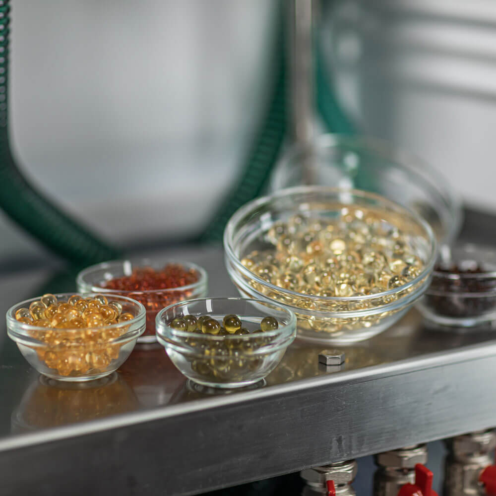 THC oil Encapsulator for the production of thc oil capsules, encapsulating thc oil. THC capsules products from oils, vaping pens, edibles, gummies and more.